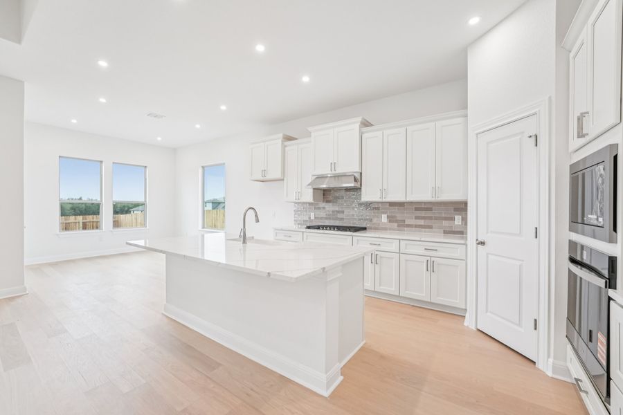 Furnished interior view inside a new home in Sage Hollow, Kyle (Image 7).