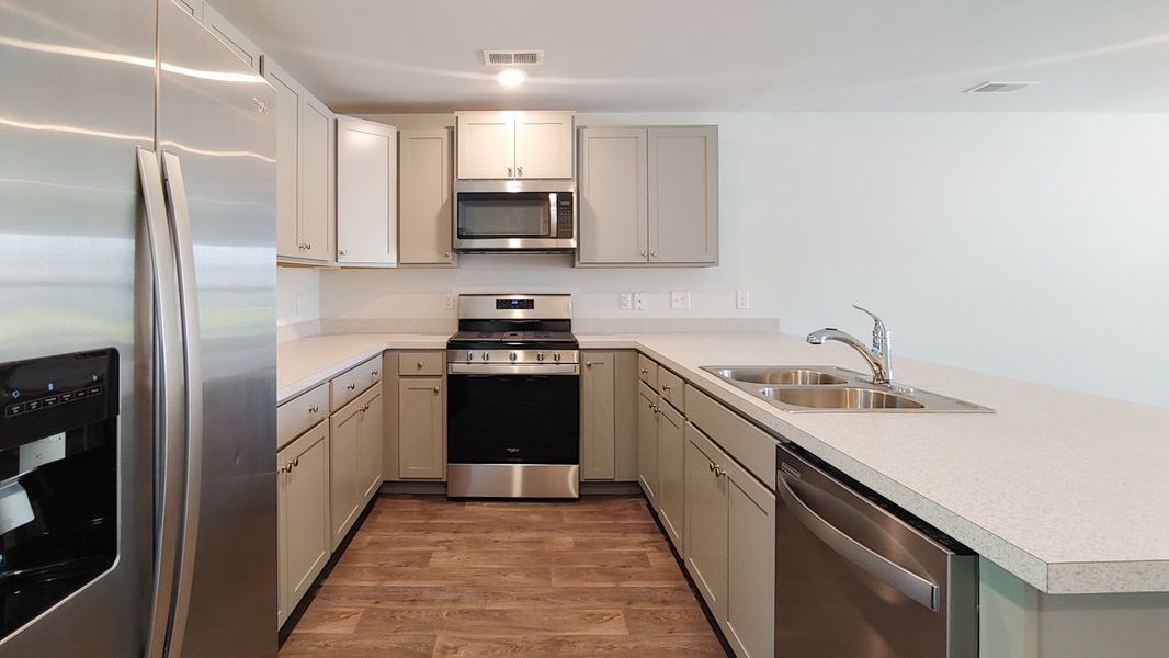Representative furnished interior of a home built from the RICHBURG by D.R. Horton in Garbon Fields, Summerville (Image 5).