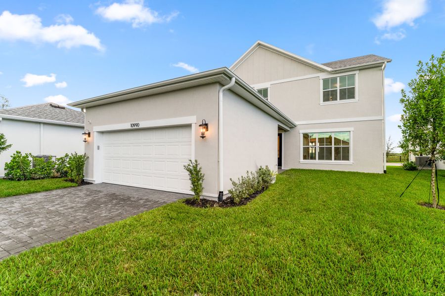 Representative exterior photo of a completed home built from the Bellis by Mattamy Homes in Newfield, Palm City, FL (Image 18).