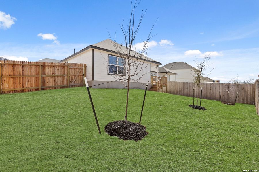 Exterior details and patio area of a home in Hunters Ranch, San Antonio (Image 15).