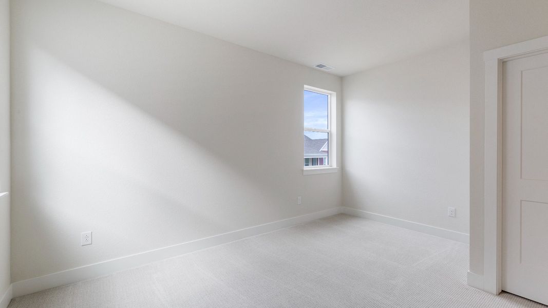 Furnished interior view inside a new home in Dillon Pointe - Journey, Broomfield (Image 27).