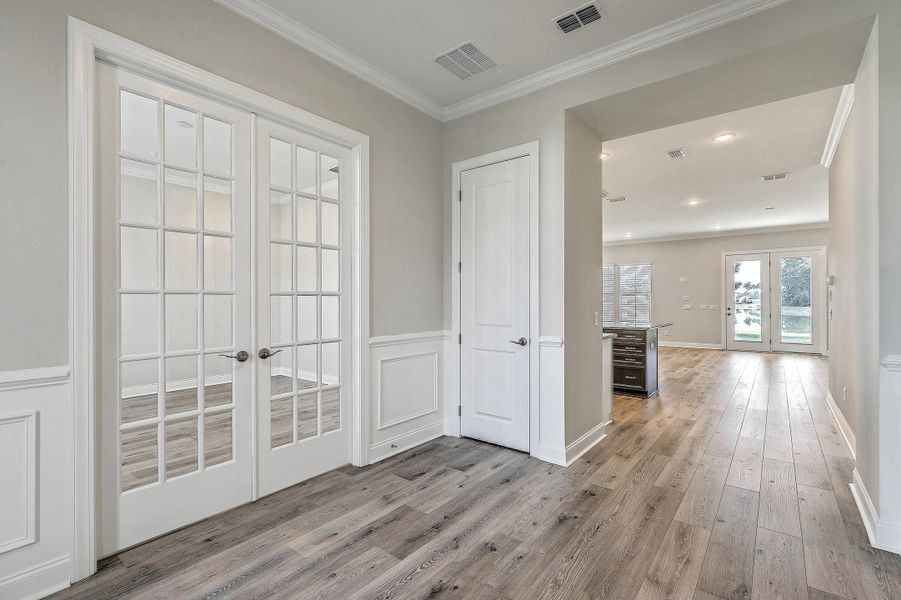 Spacious, unfurnished interior of a new home in K. Hovnanian's® Four Seasons at Lakes of Cane Bay, Summerville (Image 30).