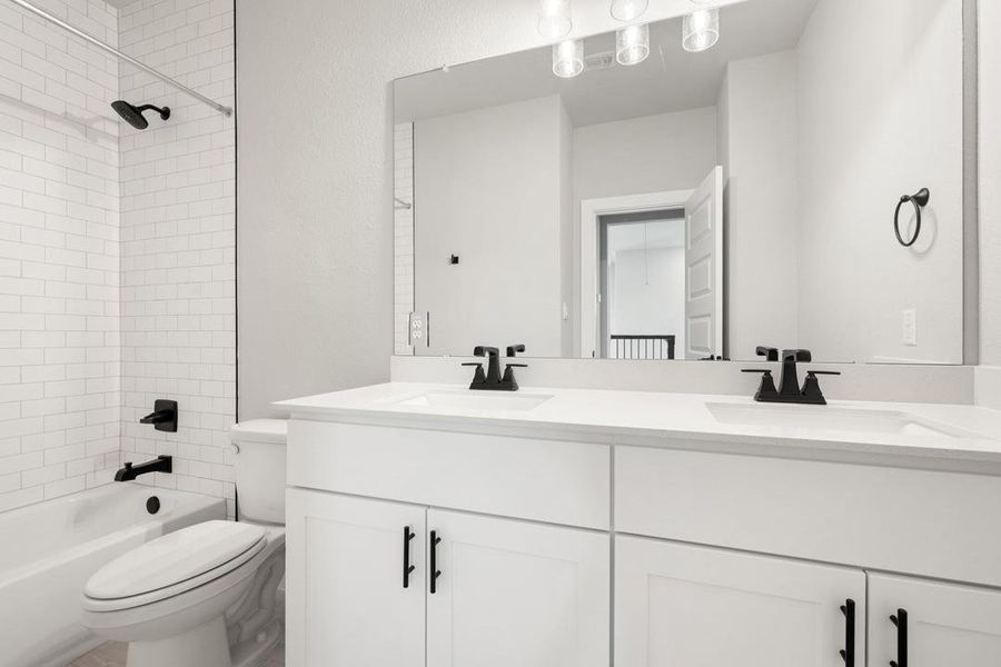 Furnished interior view inside a new home in Heritage, Dripping Springs (Image 9).