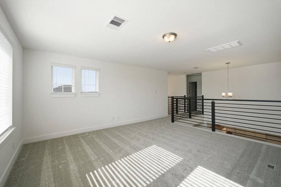 Spacious, unfurnished interior of a new home in Sunterra Lakes, Brookshire (Image 18).