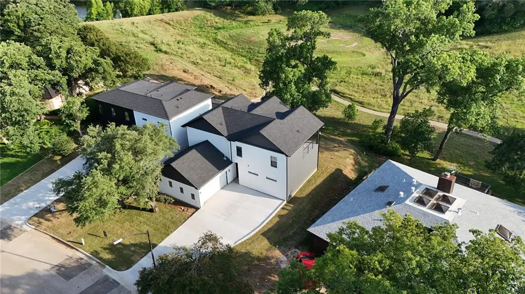 Front exterior of a new home in , Fort Worth, TX, highlighting curb appeal (Image 2). Front exterior of a new home in , Fort Worth, TX, highlighting curb appeal (Image 2).