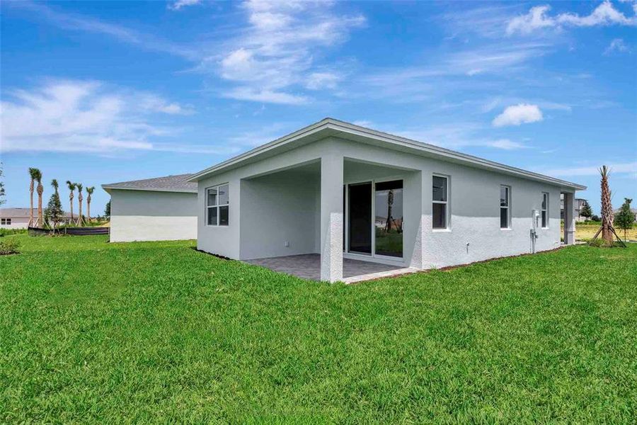 Exterior details and patio area of a home in Cresswind at Lake Harris, Tavares (Image 32).
