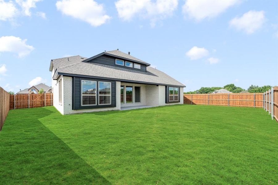 Front exterior of a new home in The Oaks, Red Oak, TX, highlighting curb appeal (Image 24). Front exterior of a new home in The Oaks, Red Oak, TX, highlighting curb appeal (Image 24).