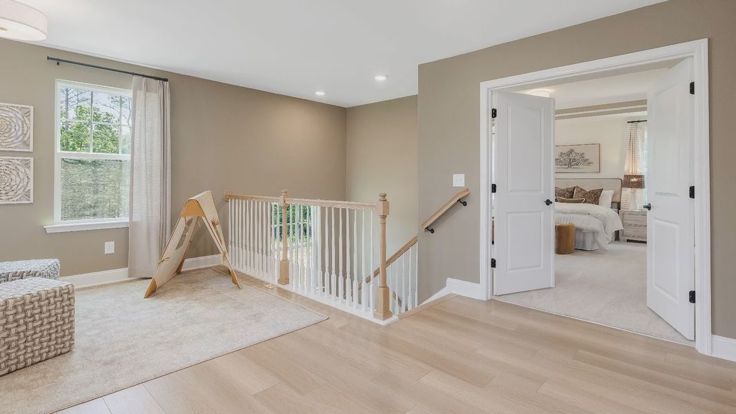 Furnished interior view inside a new home in Sidney Creek Single Family, Zebulon (Image 21).
