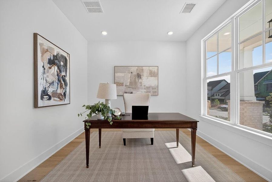 Office featuring wood finished floors and recessed lighting Office featuring wood finished floors and recessed lighting