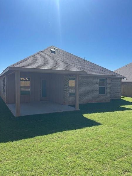 Exterior details and patio area of a home in , Springtown (Image 4).