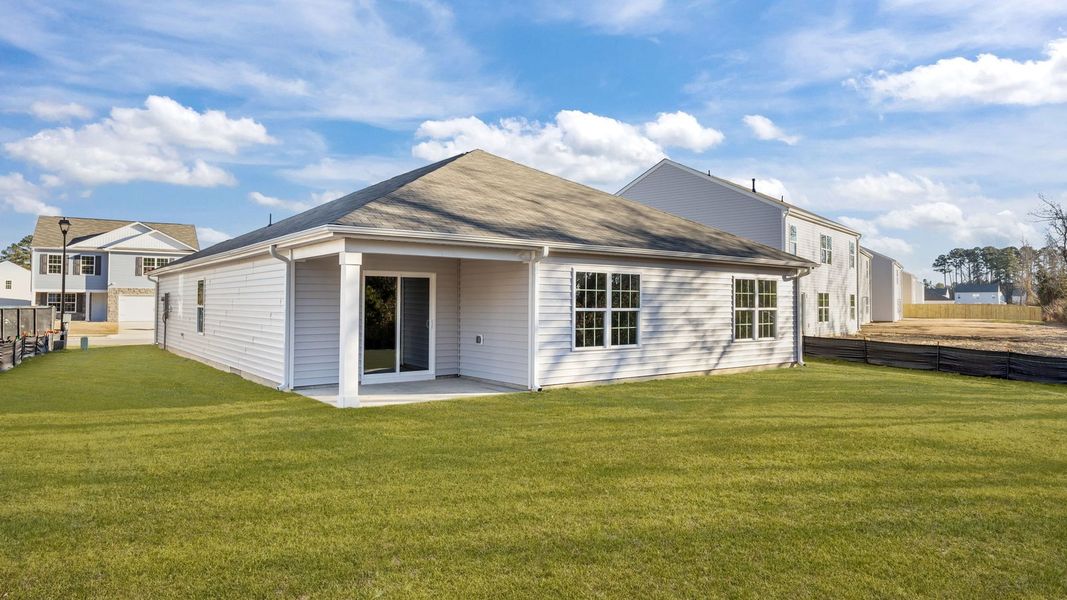 Exterior details and patio area of a home in Madeline Farm, New Bern (Image 19). Exterior details and patio area of a home in Madeline Farm, New Bern (Image 19).