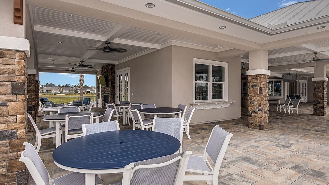 Exterior details and patio area of a home in Cherry Elm at SilverLeaf, St. Augustine (Image 2). Exterior details and patio area of a home in Cherry Elm at SilverLeaf, St. Augustine (Image 2).