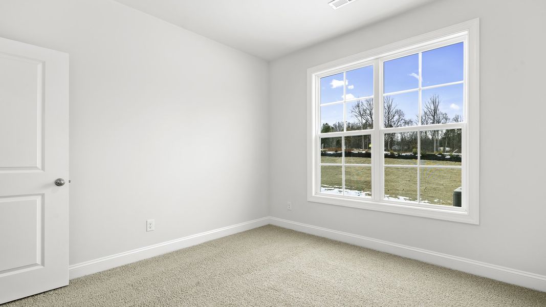 Spacious, unfurnished interior of a new home in Lybrook Village, Advance (Image 10).