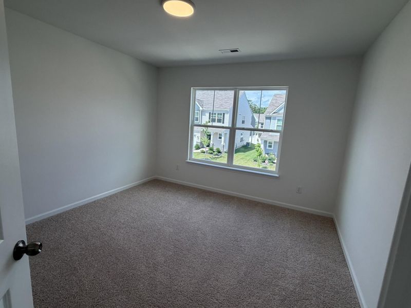 Spacious, unfurnished interior of a new home in Riverbrooke Townhomes, Simpsonville (Image 10).