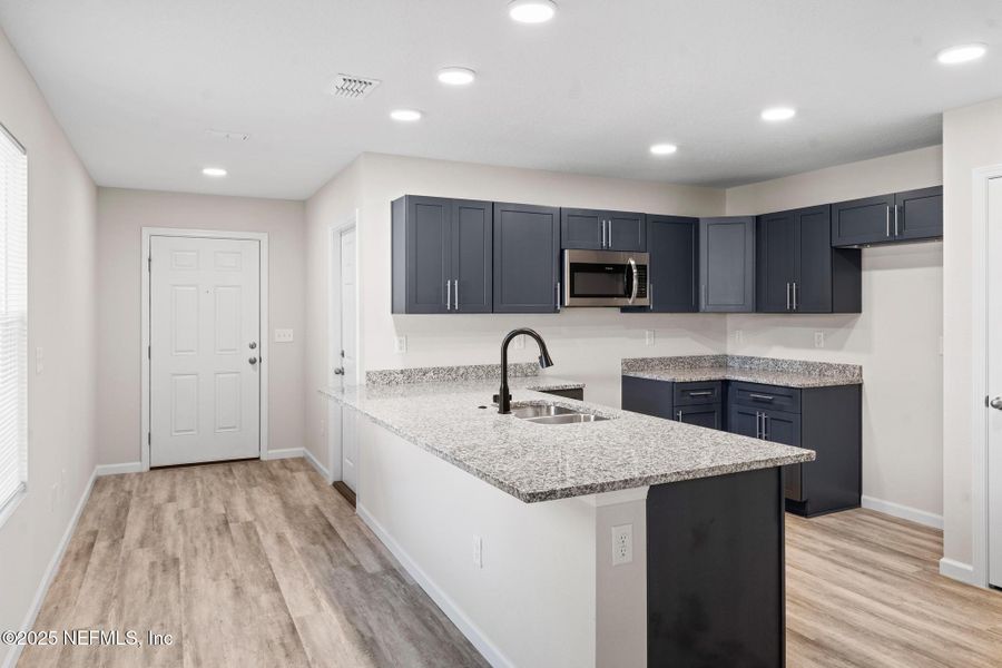 Furnished interior view inside a new home in , Atlantic Beach (Image 12).