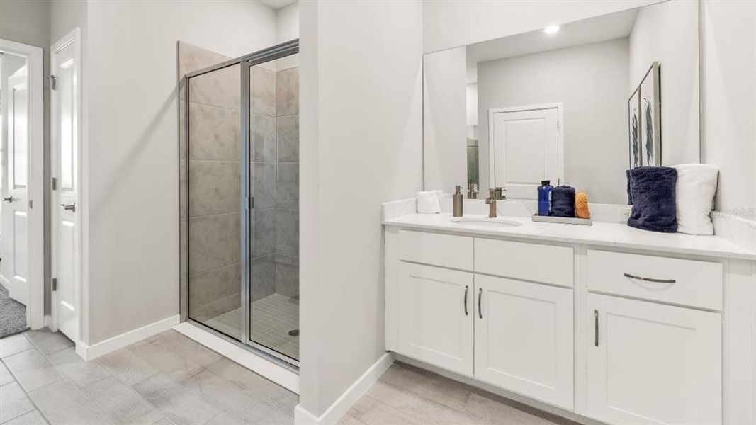 Furnished interior view inside a new home in Coral Lakes - Tradition & Express, Punta Gorda (Image 14).