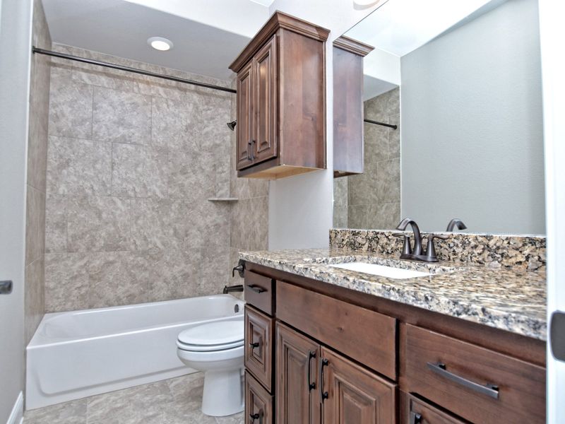 Representative furnished interior of a home built from the San Simeon II by Giddens Homes in Clearwater Ranch, Liberty Hill (Image 60).