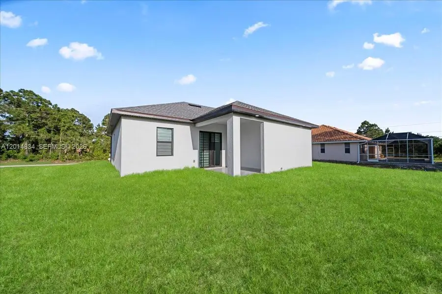 Exterior details and patio area of a home in , Lehigh Acres (Image 36).