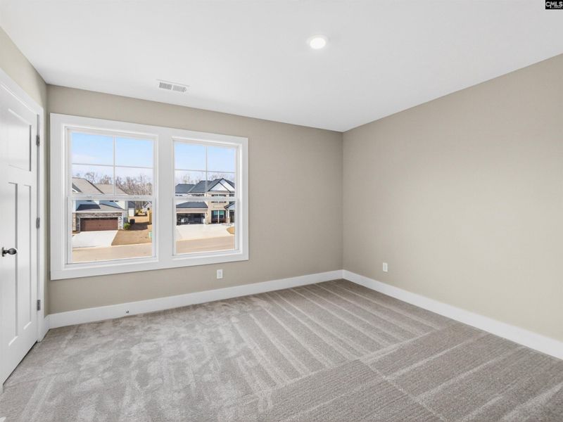 Spacious, unfurnished interior of a new home in Collins Cove, Chapin (Image 49).
