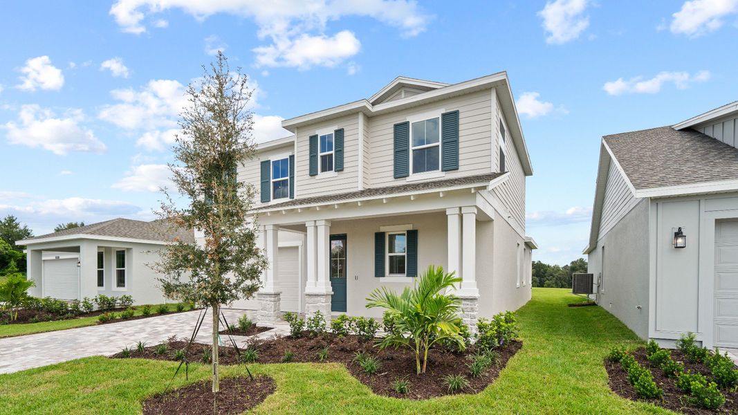 Mangrove Front Exterior by DRB Homes, New Homes in Saint Cloud, FL at Lakeside at Satilla
