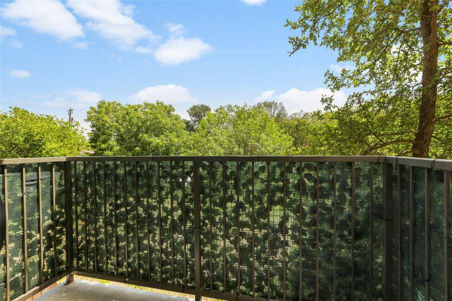 Exterior details and patio area of a home in East Grove Condominiums, Austin (Image 1). Exterior details and patio area of a home in East Grove Condominiums, Austin (Image 1).