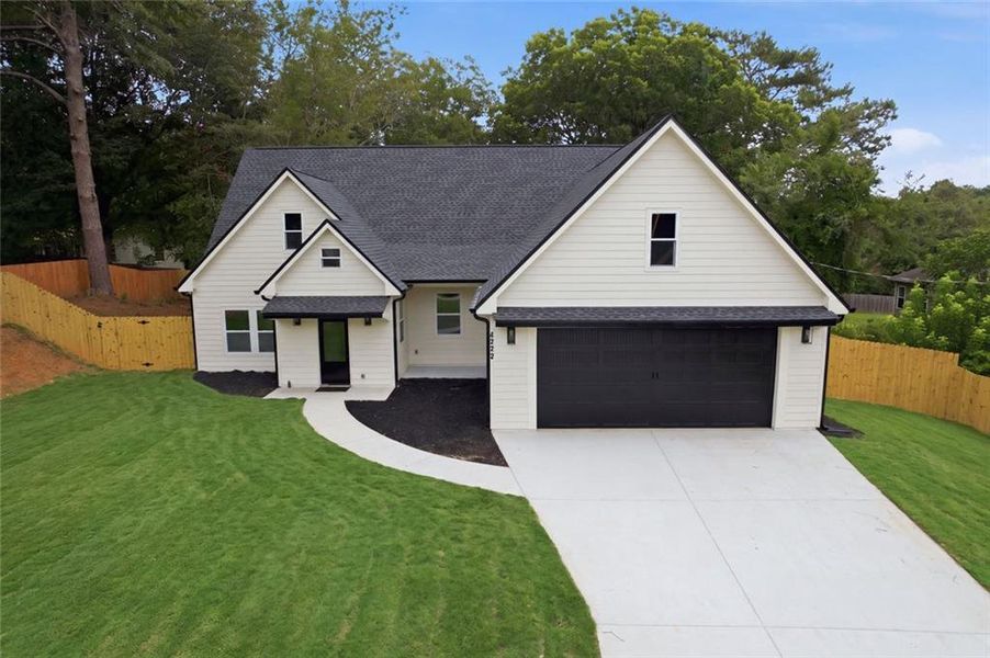 Front exterior of a new home in , Douglasville, GA, highlighting curb appeal (Image 31).
