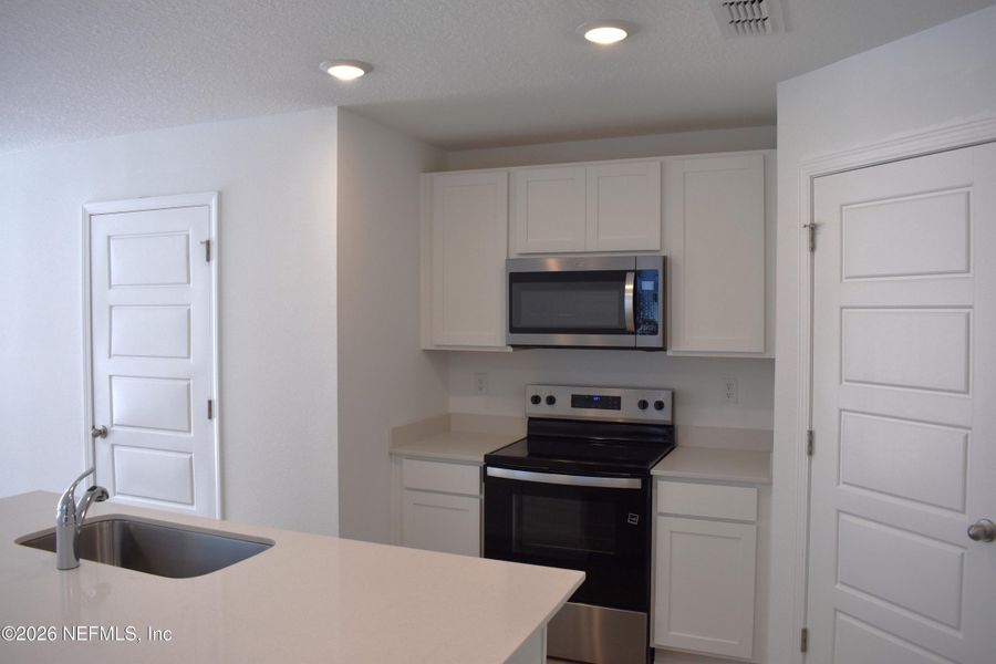 Furnished interior view inside a new home in Irongate Villas, Jacksonville (Image 13).