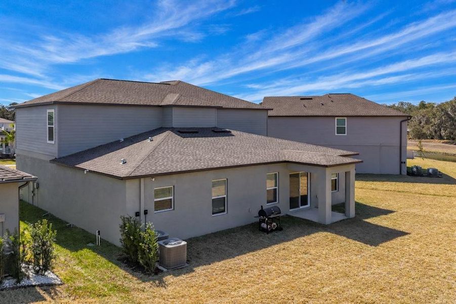 Exterior details and patio area of a home in Berry Bay: The Executives, Wimauma (Image 24).