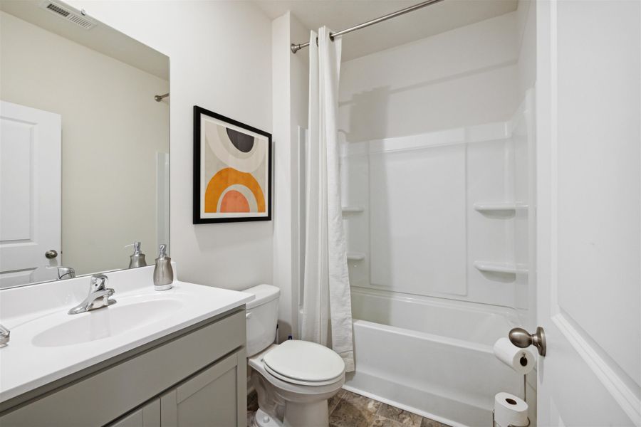 Representative furnished interior of a home built from the Hayden by D.R. Horton in Hillcrest Landing, McDonald (Image 12).