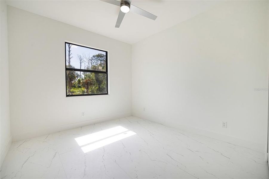 Spacious, unfurnished interior of a new home in , Port Charlotte (Image 30).