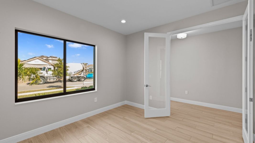 Spacious, unfurnished interior of a new home in SkySail, Naples (Image 26).