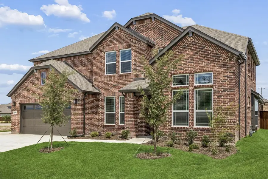 Representative exterior photo of a completed home built from the The Mockingbird by Lillian Custom Homes in Polo Ridge, Forney, TX (Image 25).