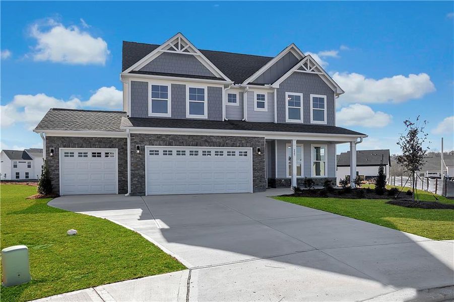 Front exterior of a new home in Twin Lakes, Hoschton, GA, highlighting curb appeal (Image 2).