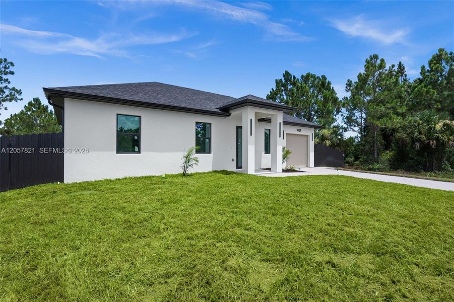 Exterior details and patio area of a home in , Lehigh Acres (Image 23). Exterior details and patio area of a home in , Lehigh Acres (Image 23).