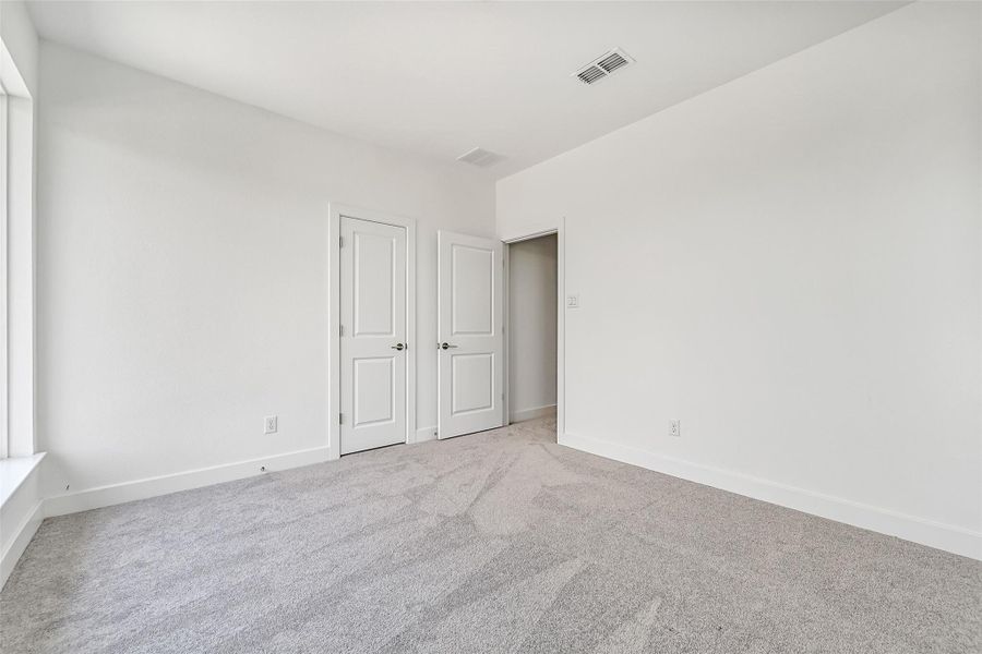 Spacious, unfurnished interior of a new home in Avalon at Friendswood 60s, Friendswood (Image 19). Spacious, unfurnished interior of a new home in Avalon at Friendswood 60s, Friendswood (Image 19).