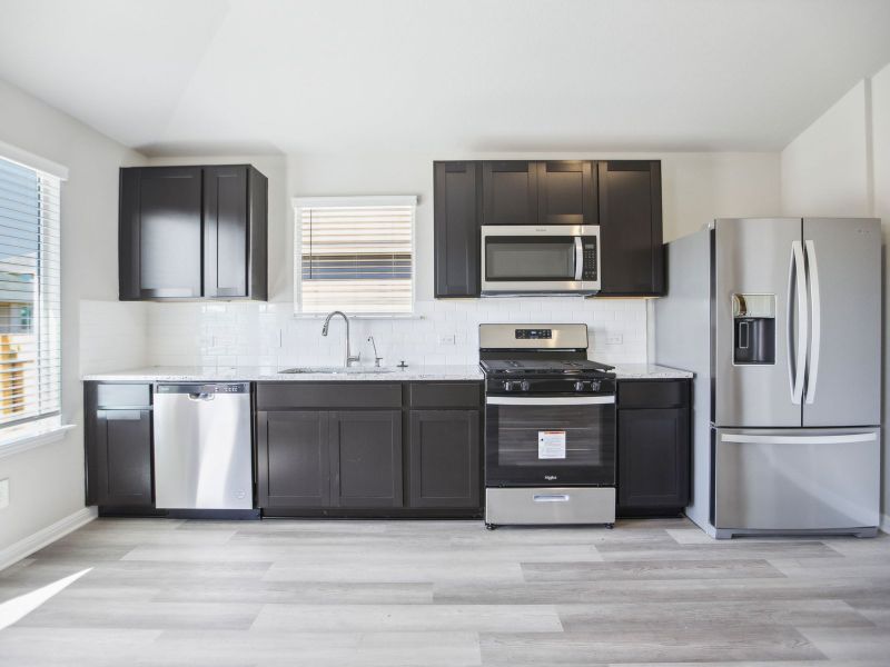 Furnished interior view inside a new home in Waterstone Crossing, Kyle (Image 3).