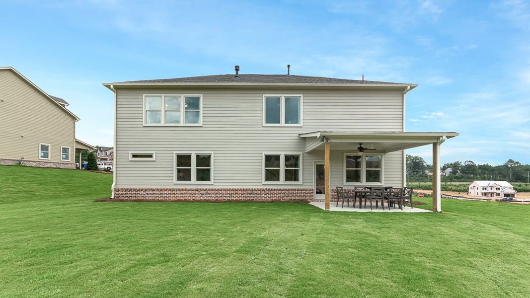 Representative exterior photo of a completed home built from the Easton by Taylor Morrison in Stratford Hills, Ball Ground, GA (Image 24). Representative exterior photo of a completed home built from the Easton by Taylor Morrison in Stratford Hills, Ball Ground, GA (Image 24).