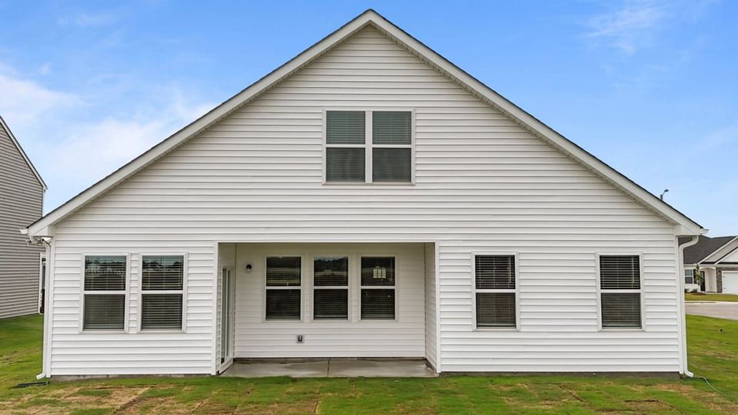 Exterior details and patio area of a home in West New Bern, New Bern (Image 3).