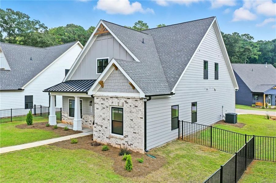 Front exterior of a new home in Ferguson Corners, Emerson, GA, highlighting curb appeal (Image 17).