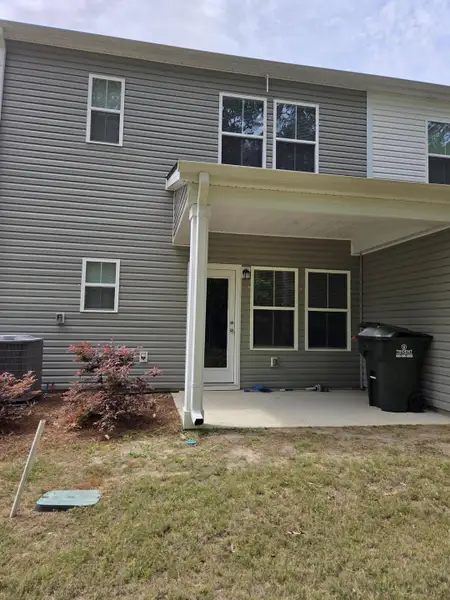Exterior details and patio area of a home in , Charleston (Image 3).