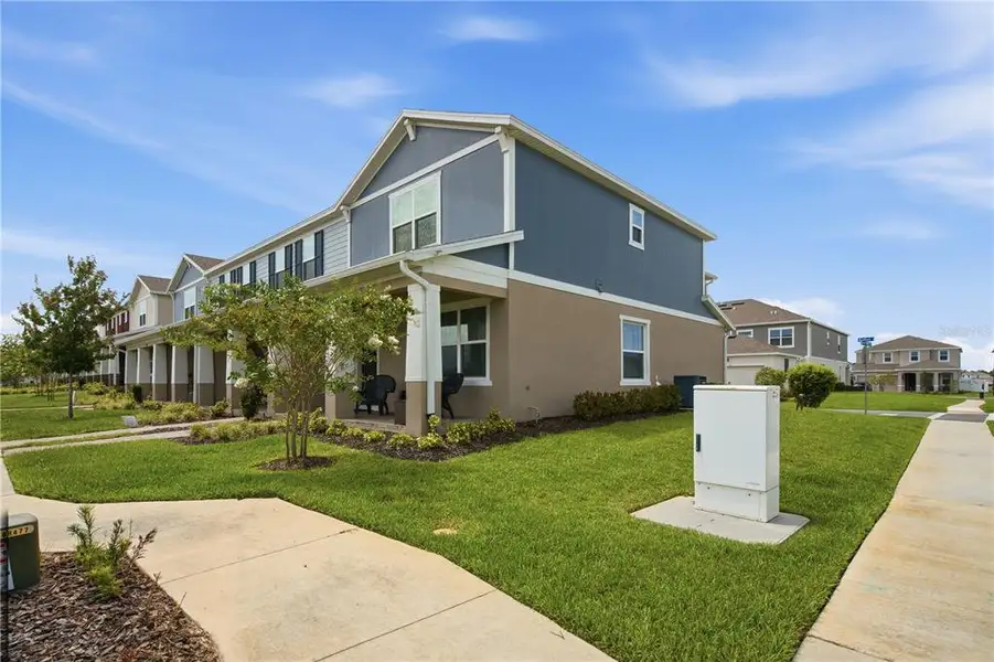 Front exterior of a new home in , Winter Garden, FL, highlighting curb appeal (Image 2). Front exterior of a new home in , Winter Garden, FL, highlighting curb appeal (Image 2).