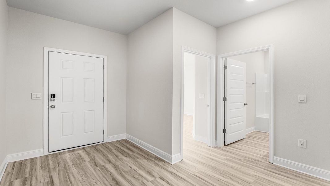 Representative unfurnished interior of a home built from the The Destin by D.R. Horton in Pine Creek and Heron Walk, Port St. Joe (Image 14).