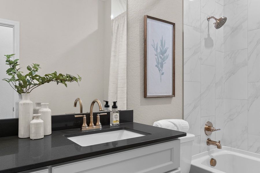 Representative furnished interior of a home built from the The Lancaster by Rosehaven Homes in Friedrich Hill, San Antonio (Image 40).