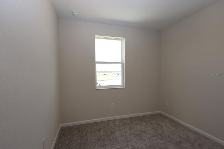 Spacious, unfurnished interior of a new home in Lake Star at Ovation, Winter Garden (Image 18).