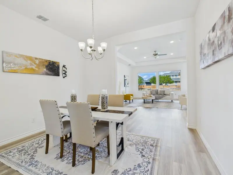 Furnished interior view inside a new home in Potranco Oaks, Castroville (Image 7).