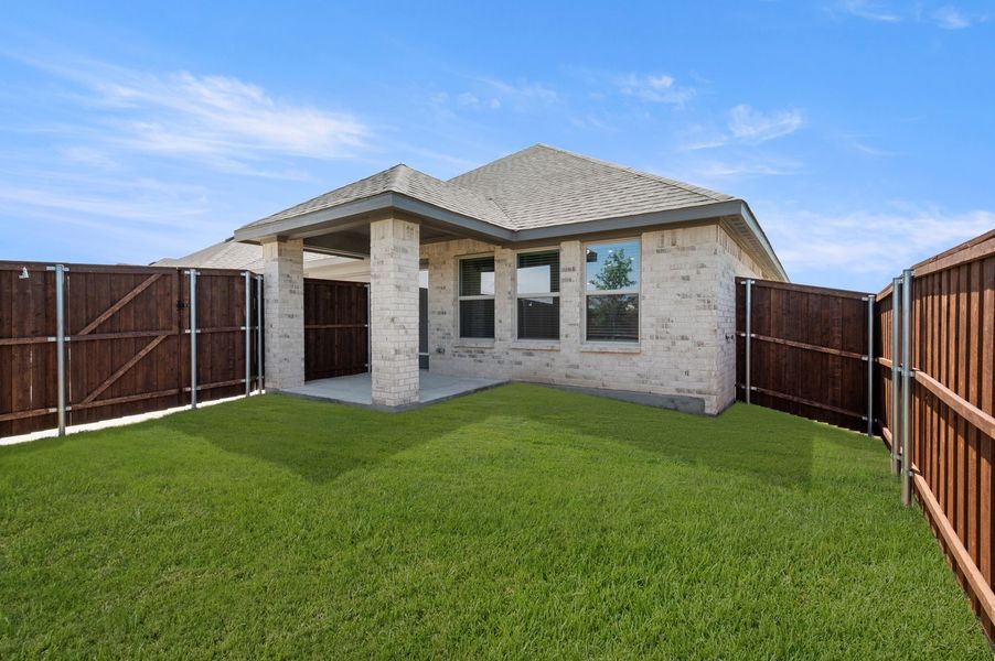 Front exterior of a new home in Redden Farms, Midlothian, TX, highlighting curb appeal (Image 27). Front exterior of a new home in Redden Farms, Midlothian, TX, highlighting curb appeal (Image 27).