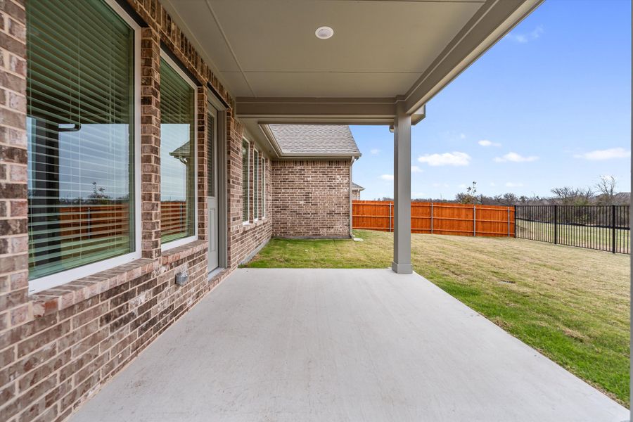 Exterior details and patio area of a home in Morningstar, Aledo (Image 28).
