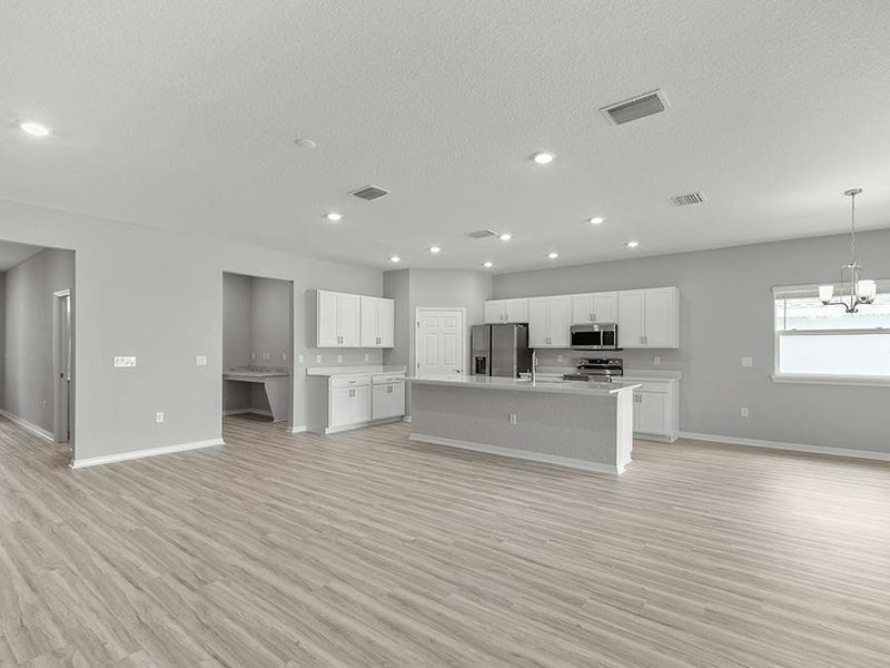 Enjoy a light-filled, open-concept living area - Aubrey II by Highland Homes Enjoy a light-filled, open-concept living area - Aubrey II by Highland Homes