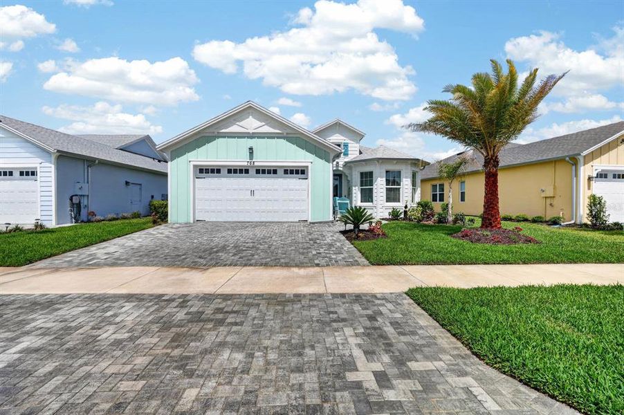 Front exterior of a new home in , Daytona Beach, FL, highlighting curb appeal (Image 31).