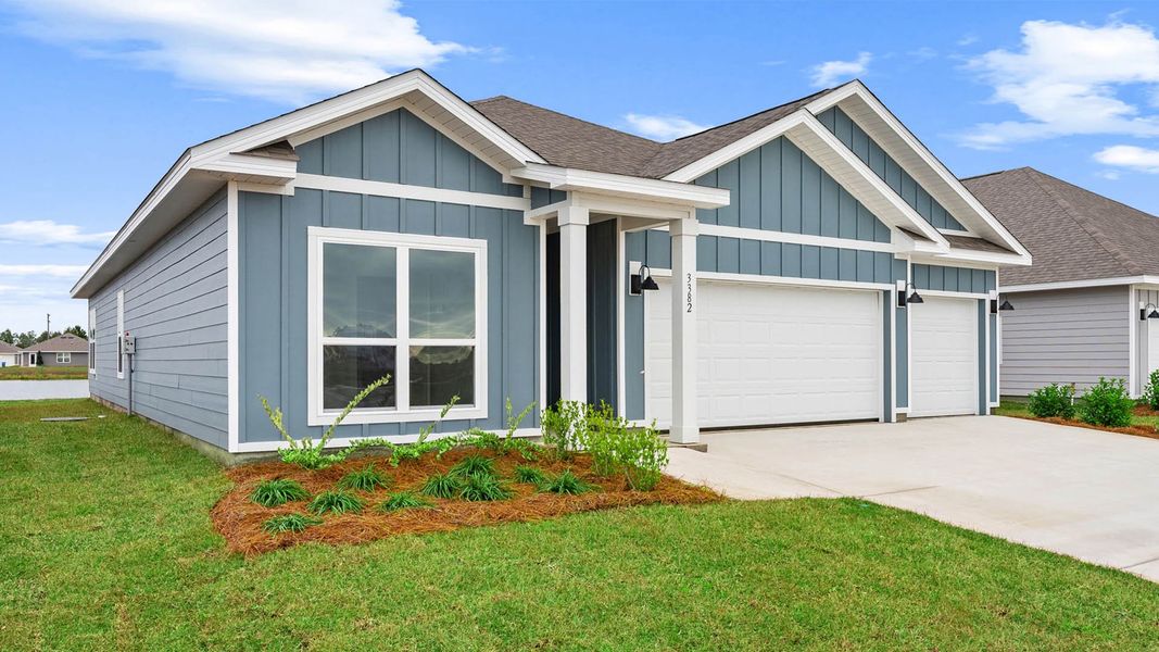 Front exterior of a new home in Hodges Bayou Plantation, Panama City, FL, highlighting curb appeal (Image 24). Front exterior of a new home in Hodges Bayou Plantation, Panama City, FL, highlighting curb appeal (Image 24).